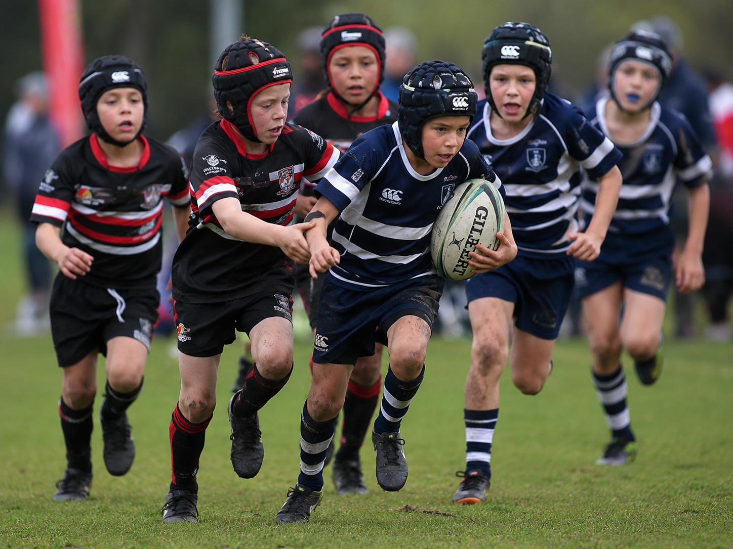 Junior rugby team in club jerseys